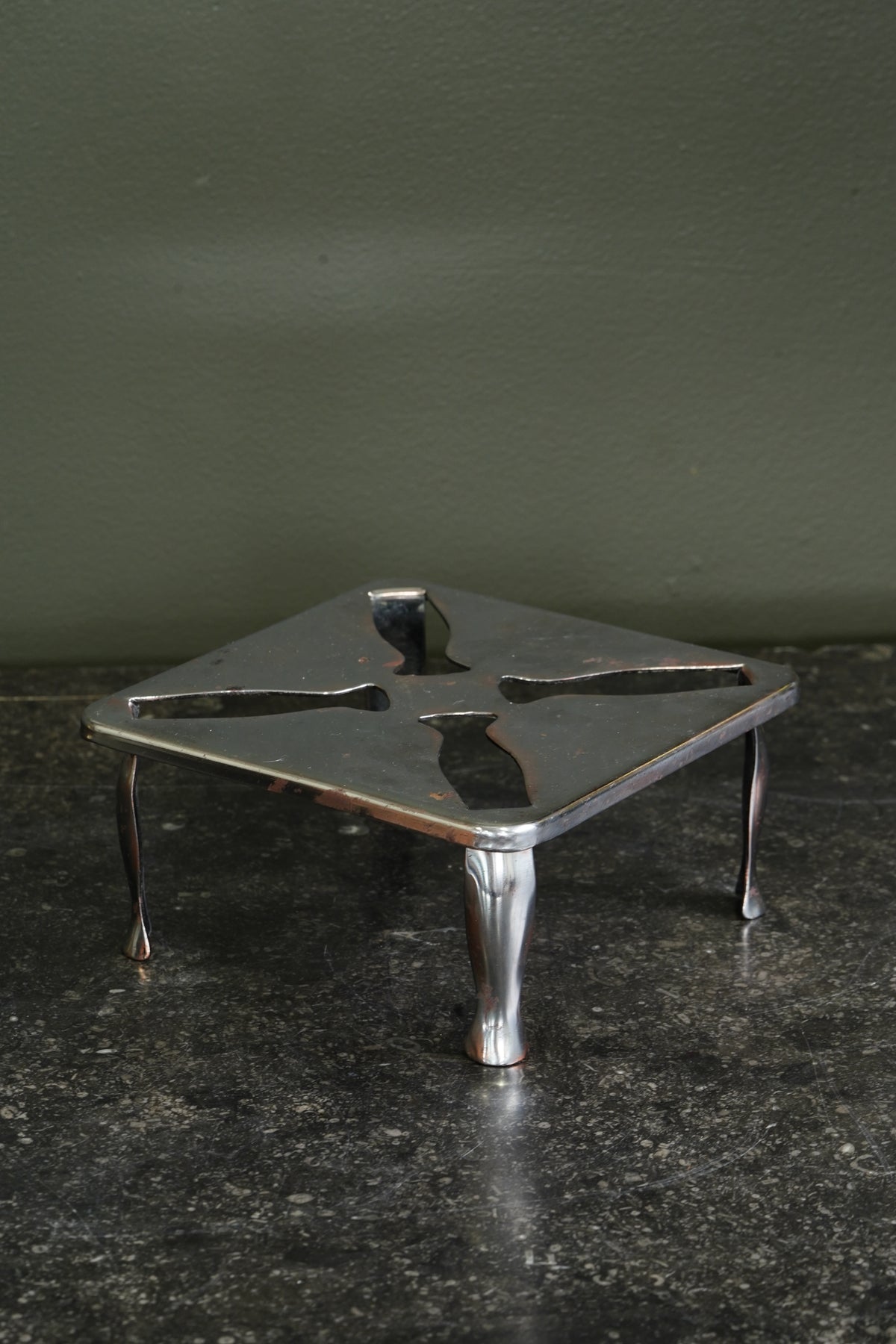 Vintage English Chrome Riser with a Pierced Pinwheel Pattern