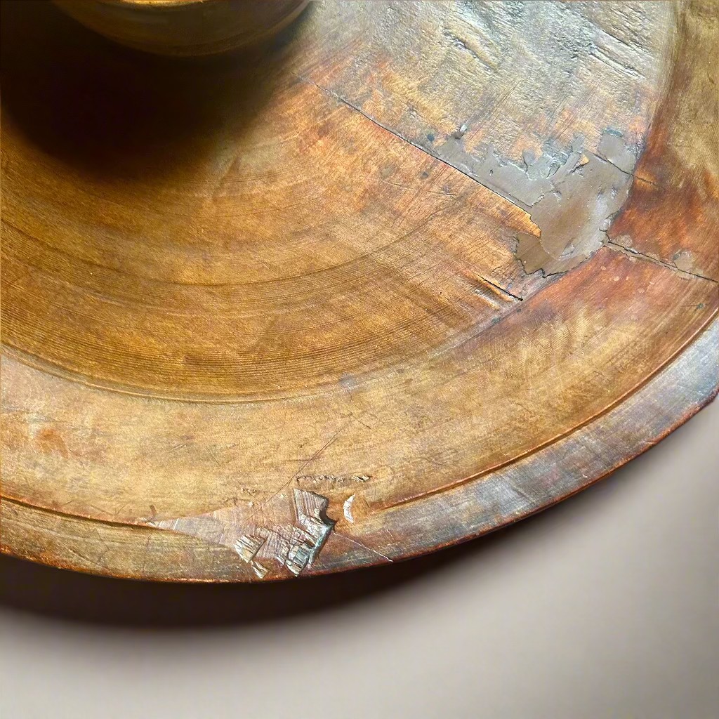 Close-up of a wooden surface with visible wear 