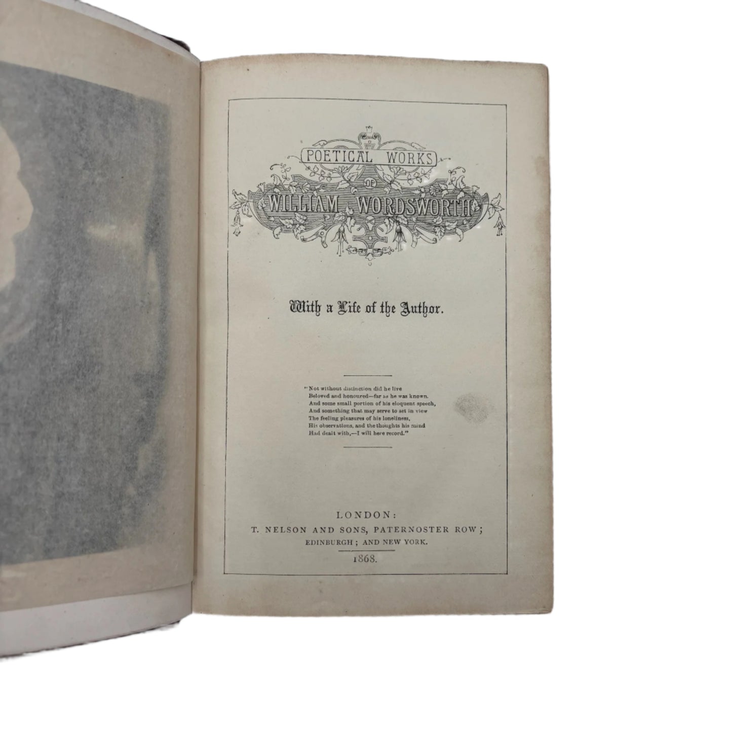 Open book with title page and portrait on a white background