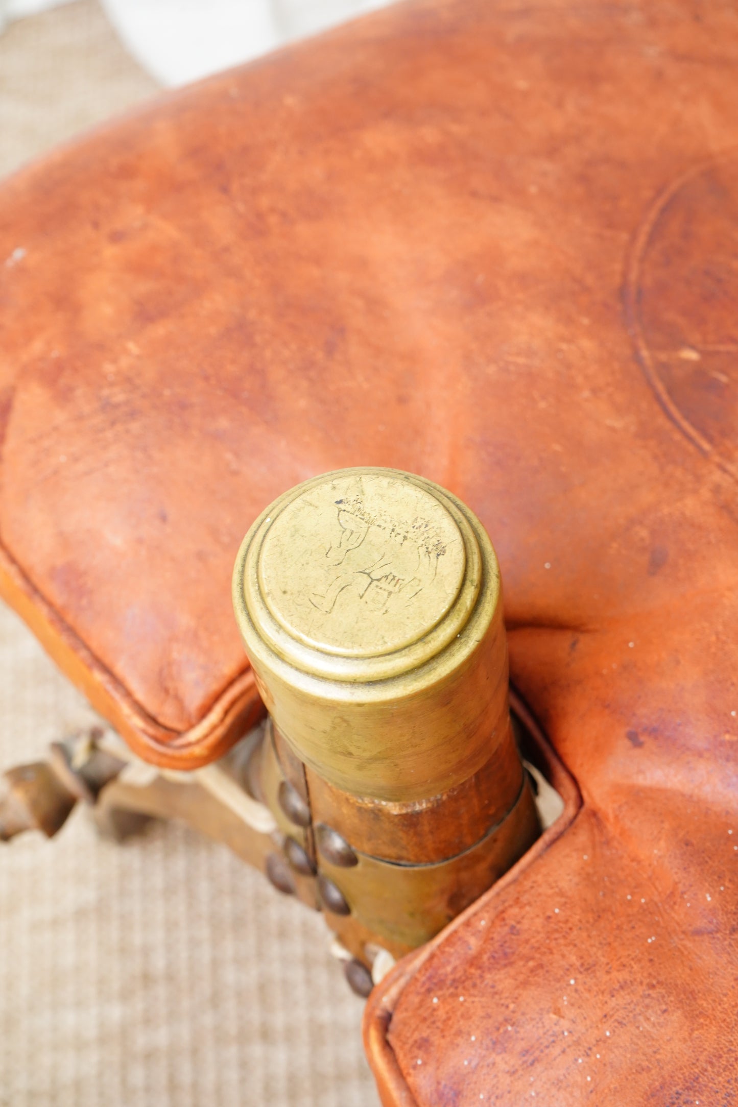 Vintage Middle Eastern Camel Saddle Stool with Embossed Leather Cushion & Brass Accents (c. 1950s)