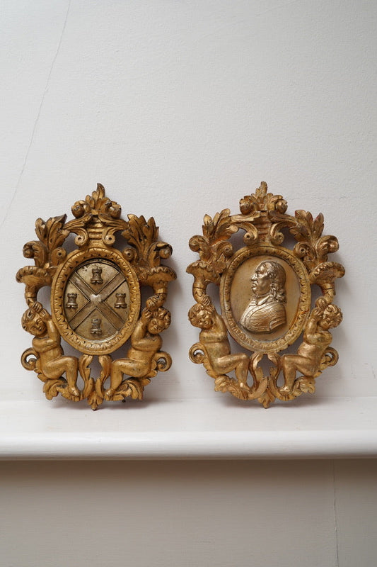 Pair of Giltwood Wall Plaques after William Wetmore Story (c. 1860–80) – Neo-Classical Portrait & Armorial