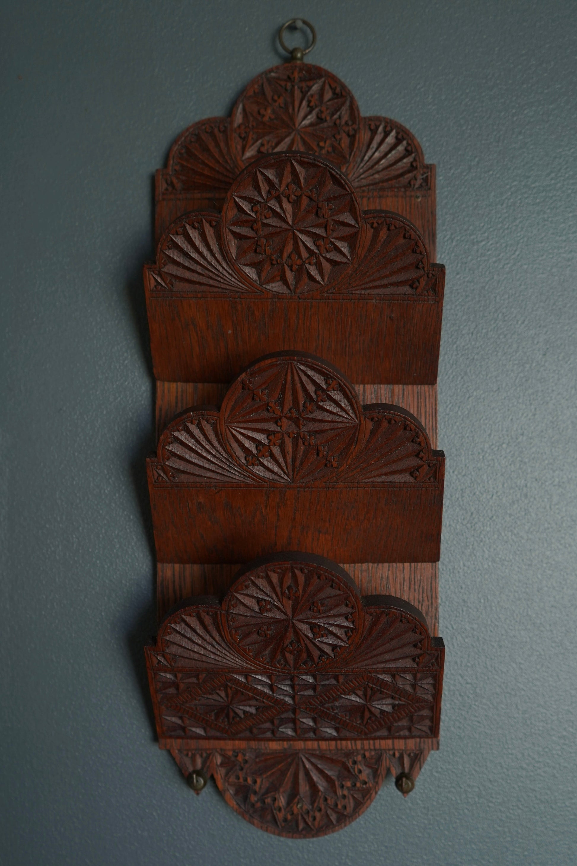 Wooden mail holder with hand-carved intricate carvings and two metal hooks