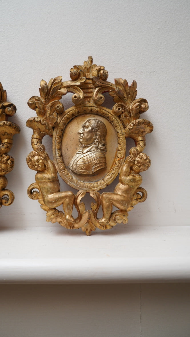 Pair of Giltwood Wall Plaques after William Wetmore Story (c. 1860–80) – Neo-Classical Portrait & Armorial