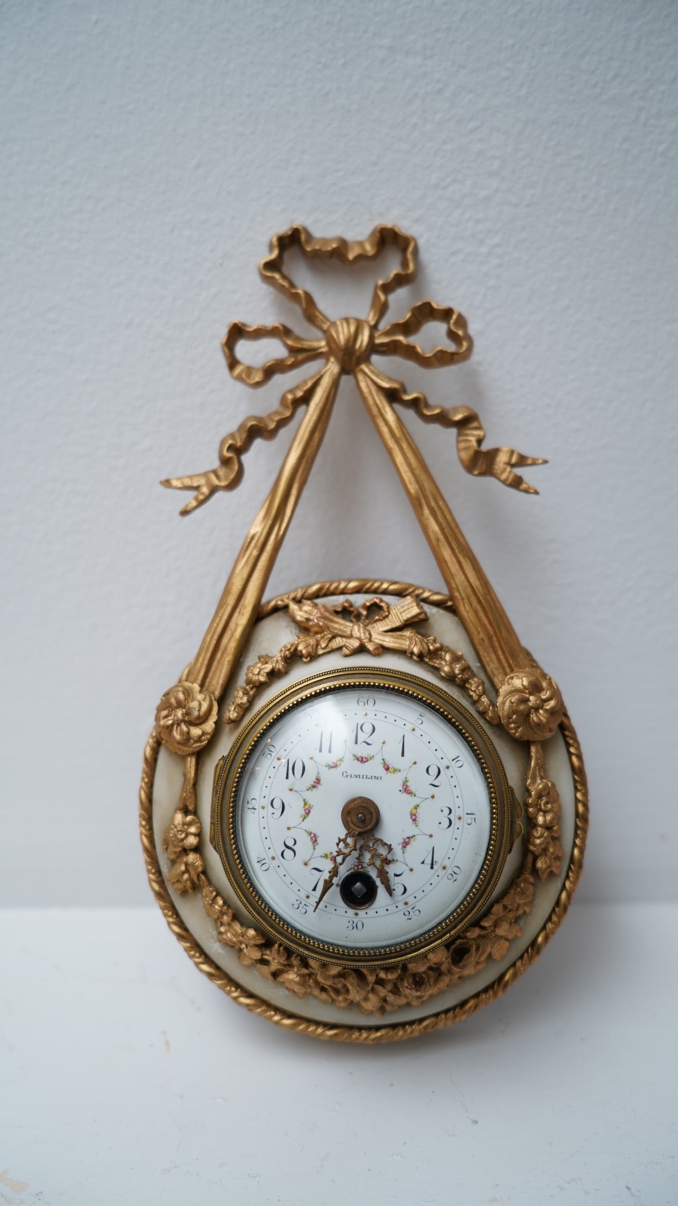 Antique French Louis XVI Style Ormolu and Alabaster Cartel Clock, c. 1880–1910