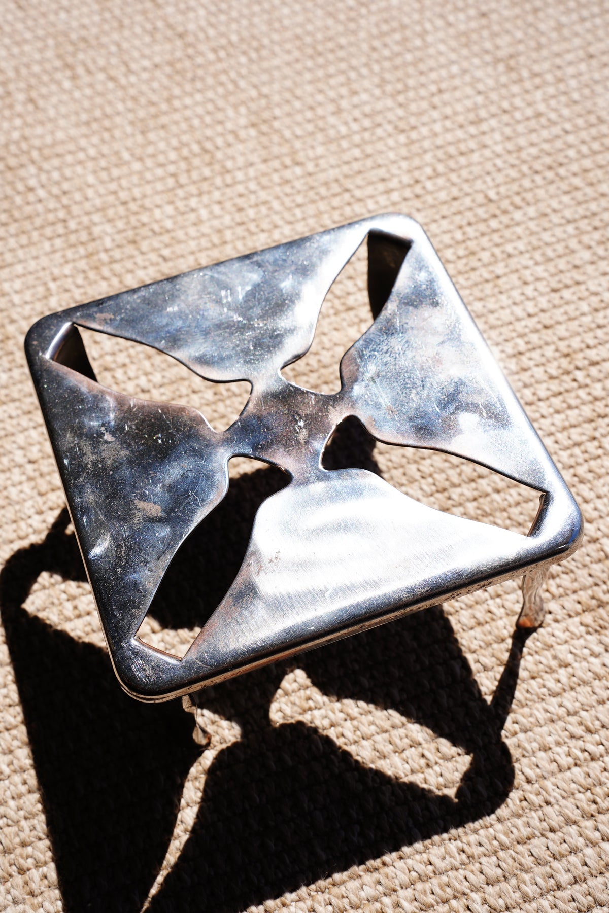 Vintage English Chrome Riser with a Pierced Pinwheel Pattern