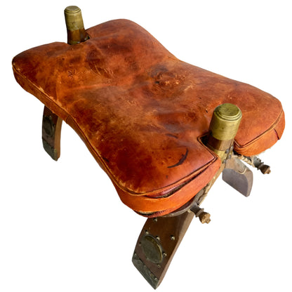 Vintage Middle Eastern Camel Saddle Stool with Embossed Leather Cushion & Brass Accents (c. 1950s)