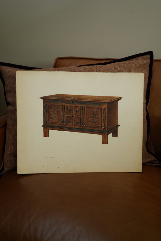 Wooden model of a cart on a white sheet with a brown background