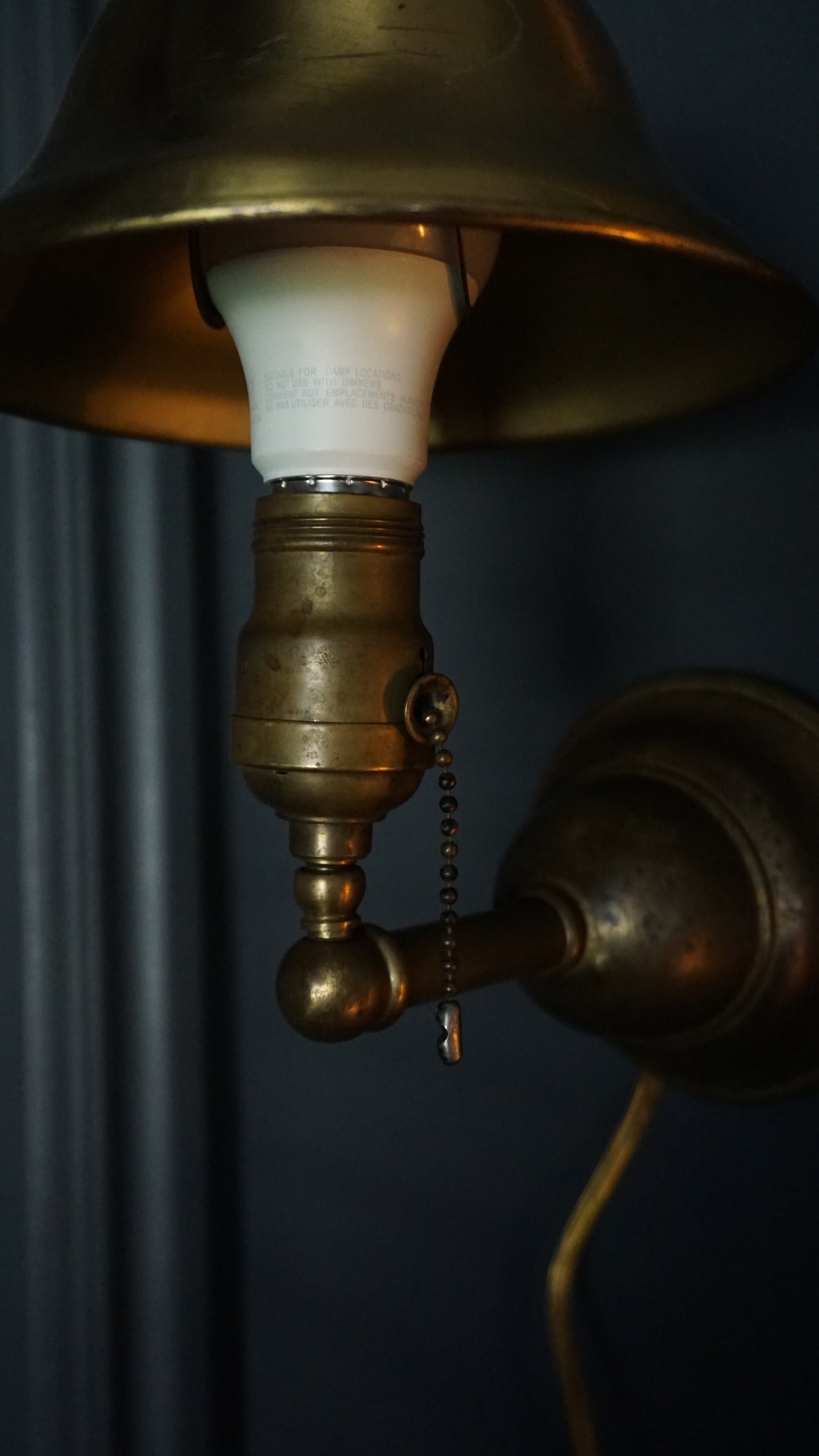 Early 20th-Century Solid Brass Wall Sconce with Bell Shade and Pull-Chain Switch