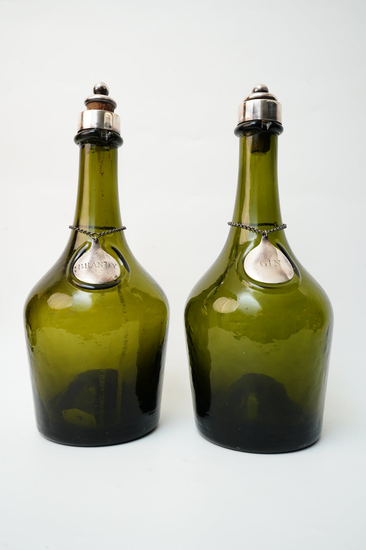 Antique Green Glass Gin and Brandy Decanters with Silver Plate Labels