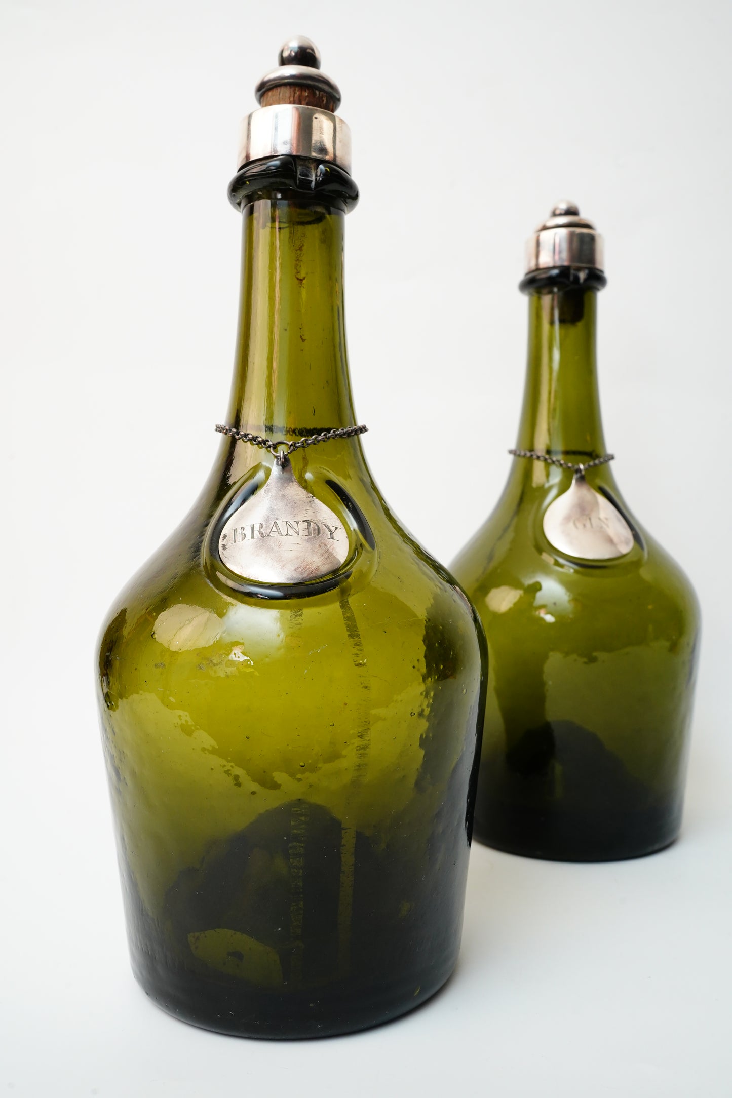 Antique Green Glass Gin and Brandy Decanters with Silver Plate Labels