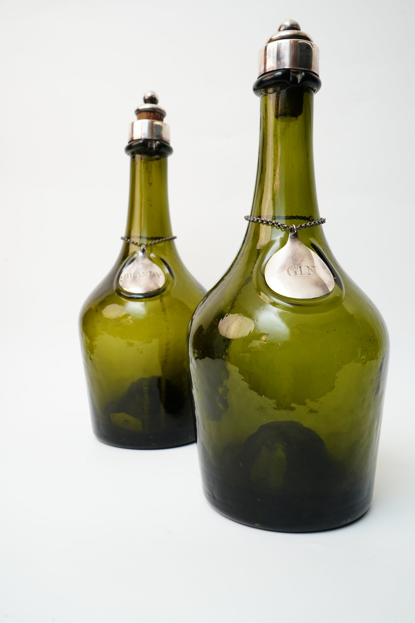 Antique Green Glass Gin and Brandy Decanters with Silver Plate Labels