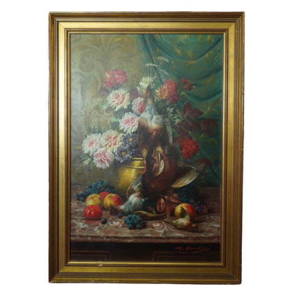 Framed still life painting with flowers and fruits on a table